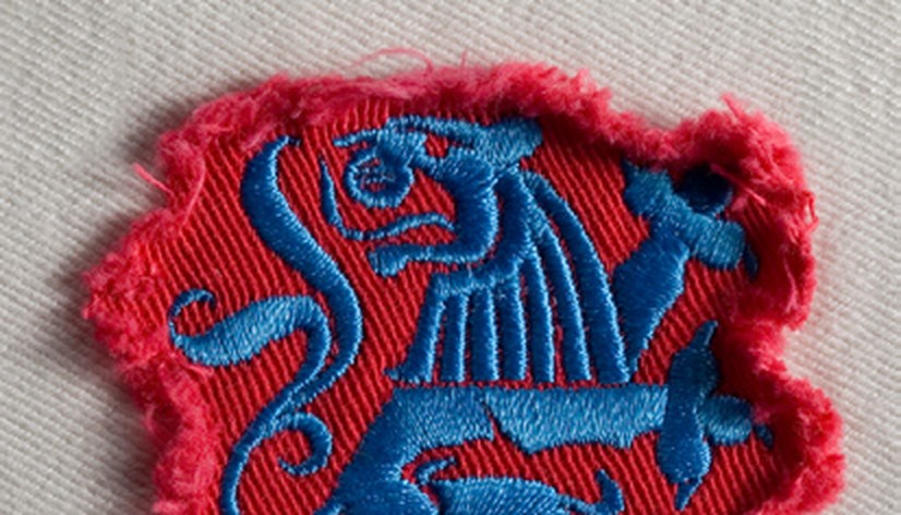 Frayed twill patch with embroidered detail