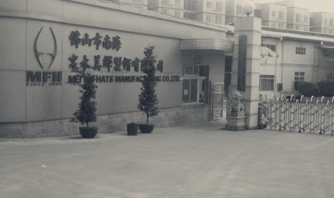 The factory entrance with Mei Fai Hats signage